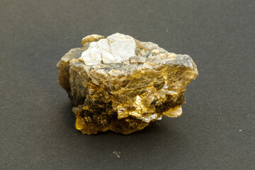 Isolated Specimen of Mica Mineral on Gray Background