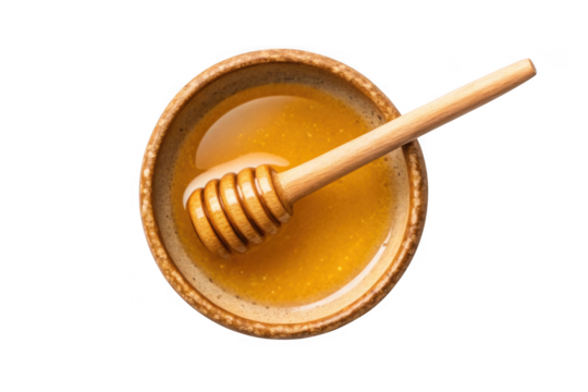 Wooden honey dipper in a bowl of golden honey isolated on transparent background