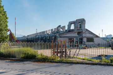 Demolition site at an athletic center in Ljubljana during renovation. Concrete stadium bleachers...