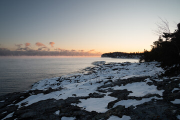 North Shore Minnesota during sea smoke on a polar vortex, winter Lake Superior 