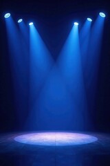 Deep blue stage, multiple spotlights create textured light, dramatic background, event, shadows