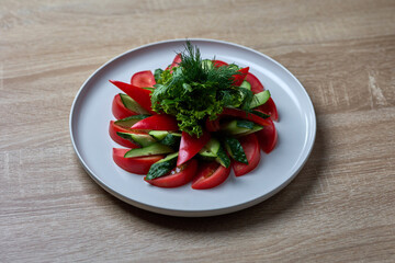 Fresh tomato cucumber salad with herbs