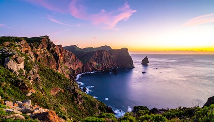 Dramatic coastal cliffs bathed in the serene light of early morning dawn