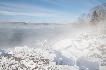 North Shore Minnesota during sea smoke on a polar vortex, winter Lake Superior 