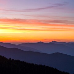 Fototapeta premium Colorful sunrise over mountain ranges