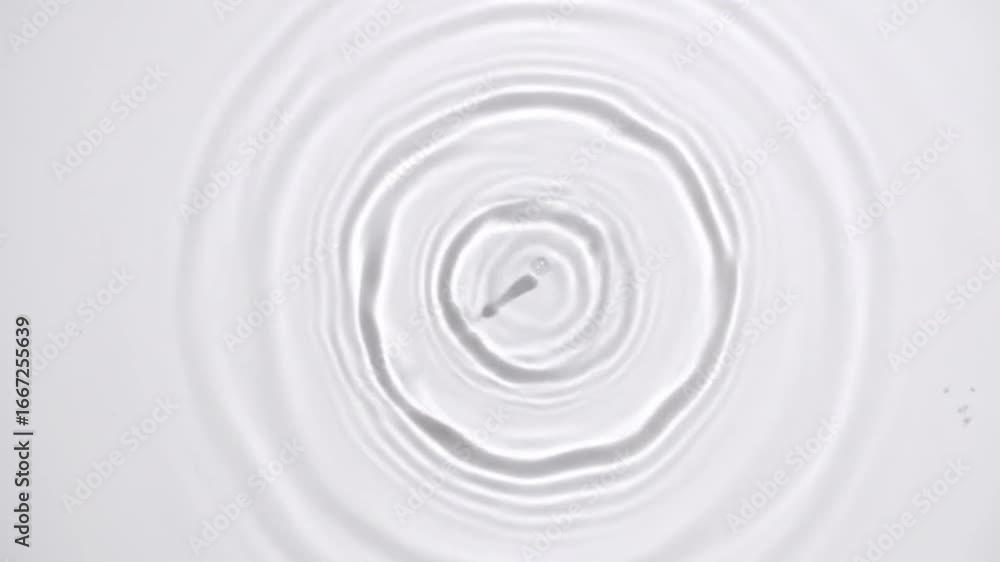 Poster water surface with ripples in concentric circles and small fish creates gentle motion on neutral bac
