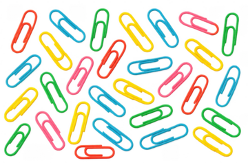 Colorful paperclips lying on transparent background