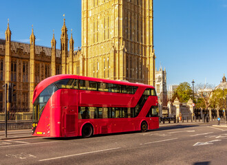 Double-decker bus at Big Ben tower in London, UK