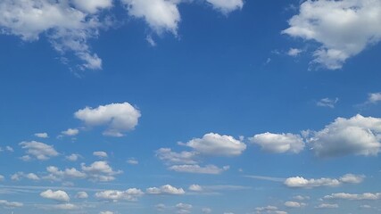 blue sky with clouds time laps - Powered by Adobe