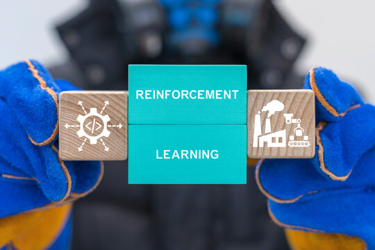 Engineer holding blocks with icons sees the words REINFORCEMENT LEARNING. Reinforcement Learning LLM Artificial Intelligence Agent Dynamic Environment Industrial Technology concept.