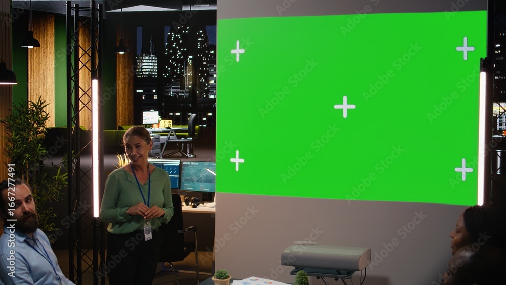 Poster diverse experts group gather for a corporate event with isolated screen after hours, aligning financ