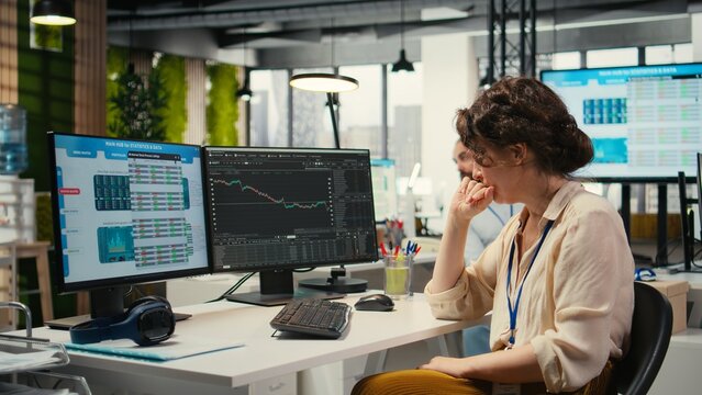 Worried finance advisor looks at forex trends market fall and losing money, dealing with a financial crisis due to stock crash price drop. Frustrated manager under pressure, bankruptcy.