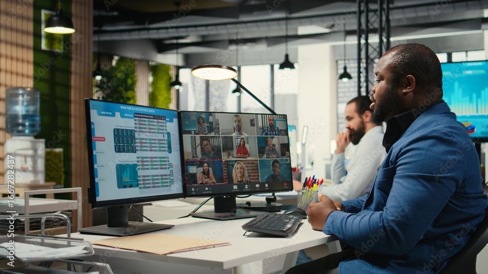 Poster black analyst meeting on online video call with associates to discuss insights and resource allocati