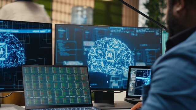 Black man IT expert handles neural networks systems for data forecasting, combining AI automation tools with digitalization to drive multinational company efficiency and innovation. Camera B.