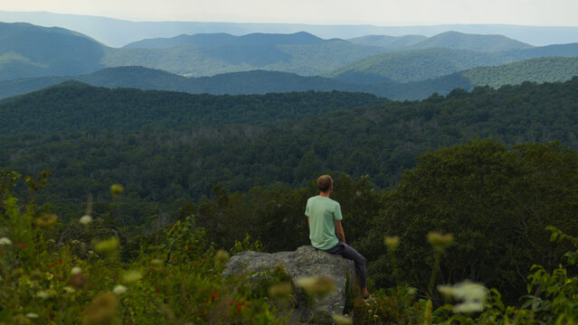 A hiker in the beautiful mountains of Shenandoah National Park, Virginia, USA