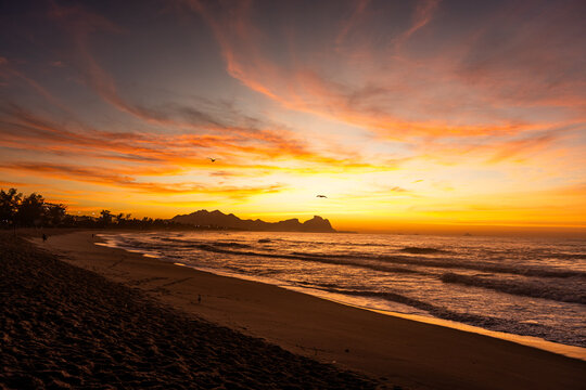 Sunrise over the beach and mountains at Recreio dos Bandeirantes, Rio de Janeiro, Brazil