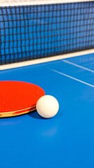 Ping pong paddle, ball on table
