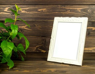 Empty white frame on dark wooden background