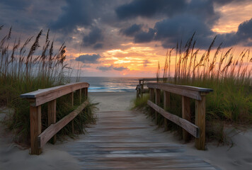 Wooden boardwalk leading to the beach at sunset in North Sea