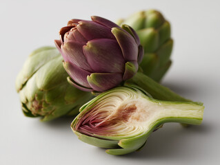 Fresh artichokes on white background, closeup.