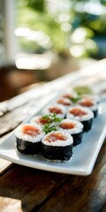 Delicious Sushi Rolls on a Plate with Fresh Ingredients in Natural Light