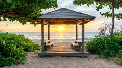 Obraz premium Wooden beach gazebo at sunrise