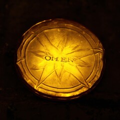 Fototapeta premium Illuminated golden amulet