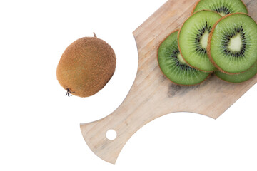 the top view of kiwi fruit slices on a cutting board with a white background isolated