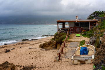 Wooden beach house in Porto Paglia beach in Sardinia, Italy