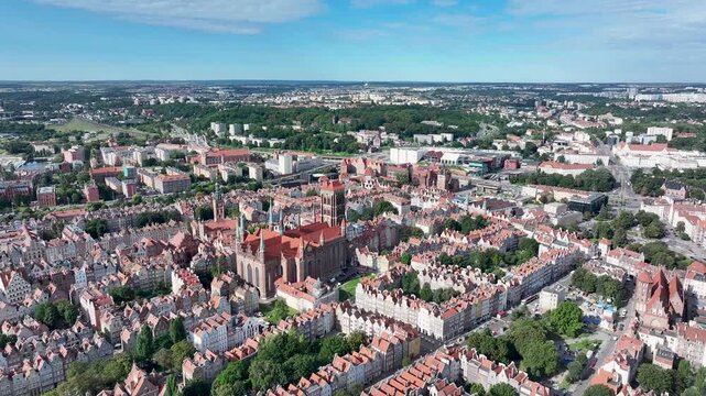 Aerial Gdansk Poland historic city center Cathedral 4K. Baltic coast of northern Poland. World War II started here with German invasion. Economic international port. Historical buildings, tourism.