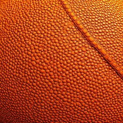 Fototapeta premium Basketball textured background, close-up of the orange leather with defined pores and reliefs, sharp colors, and high-impact details. Sports broadcasts.