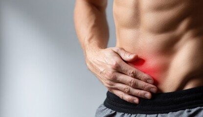 Close up of an athlete experiencing abdominal pain, highlighting the discomfort and potential health issues related to physical strain