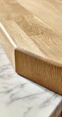 Oak wood countertop edge detail, marble background, kitchen, interior design
