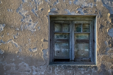 old dilapidated window and wall with copy space on the left side