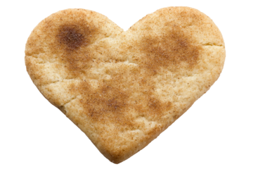 A cinnamon roll shaped like a heart