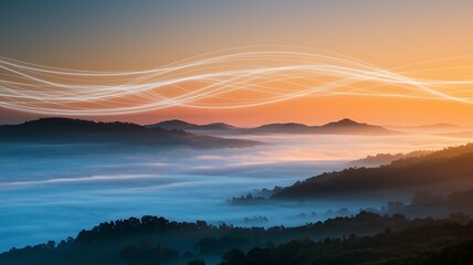 Serene Sunrise Over Layered Mountain Range in Haze