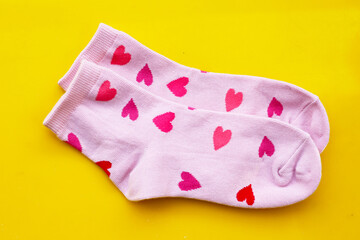 Cute light pink socks with red and pink heart patterns