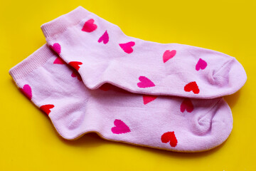 Cute light pink socks with red and pink heart patterns