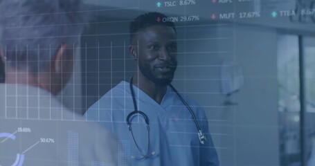 Talking doctor wearing scrubs with stethoscope in hospital corridor, with digital charts overlay