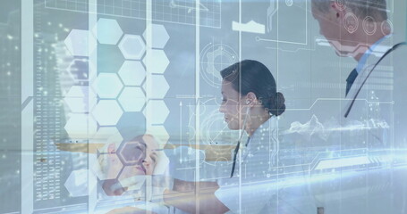 Doctors with stethoscopes examining senior male patient on bed in ward with holographic graphics