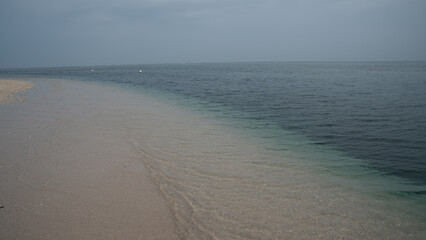 Isla de Enmedio, Veracruz. Pristine sandy beach and turquoise sea under clear blue sky in Mexico.