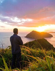 Man contemplating sunset over ocean (1)