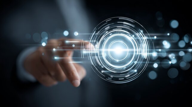 A hand is touching a futuristic digital interface with holographic circular elements, representing advanced technology interaction.