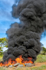 Burning of used tires at Side Road of the GO-10 highway, between the municipalities of Luziania and Caldas Novas. Goias, Brazil, February 2019