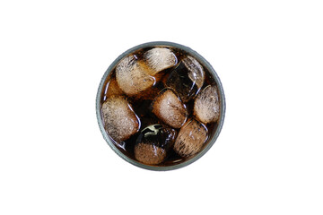 A cold glass of cola with ice in a glass
