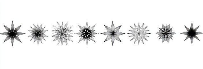 A collection of black and white star-shaped decorative items with various intricate designs.