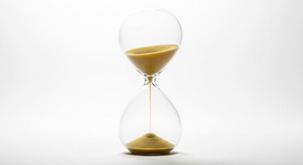 Transparent glass hourglass with golden sand flowing on white background in minimal style