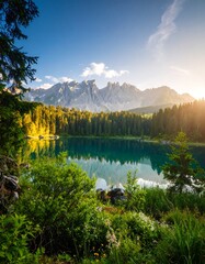 Naklejka premium Mountain lake sunrise tranquil