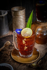 Ice Lemon Tea with Butterfly Pea Flower in Vintage Stye.