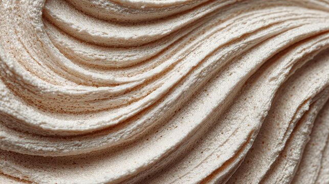 Creamy, light beige texture with flowing lines